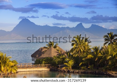 Sunset over the sea and mountains,  Tahiti.