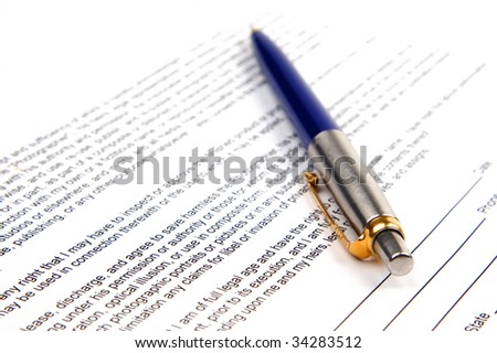 the pen on the document