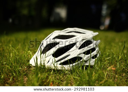 Bicycle helmet and cycle gloves isolated on white background