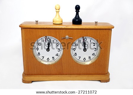 chess clock and pawns