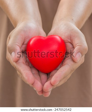 Heart in hands for give.