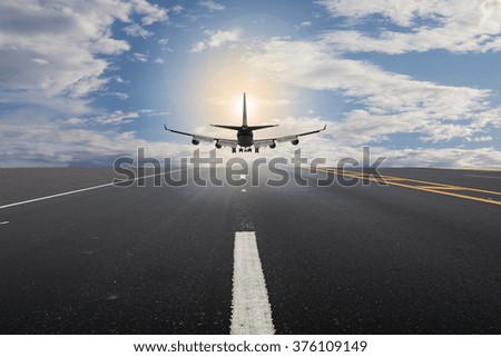 Passenger plane take off from runways with cloud sky