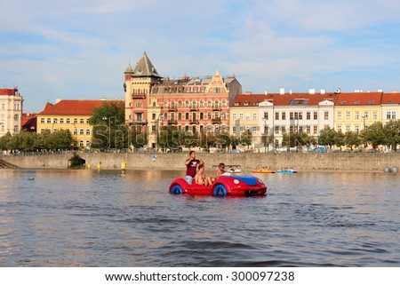 PRAGUE JULY 22: Pedal boat car with young man on the river Vltava in centre of Prague, Czech Republic 2015