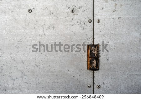 Texture of galvanized metal with rusty hinge  and rivets