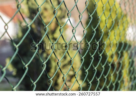 Green wire fence in the garden
