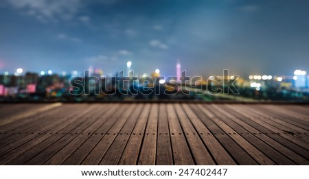 wooden platform and lights of night,guangzhou china.