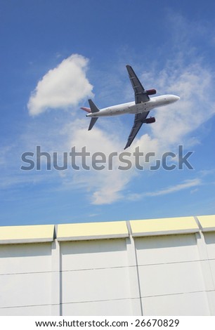 the airplane on  the blue sky background.