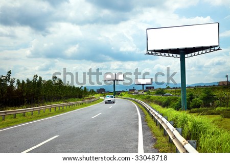 the billboard and road outdoor.