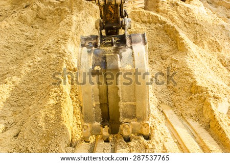 track-type loader excavator machine doing construction zone  work  sand for construction