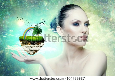 World of Magic. Female portrait with abstract world in hand