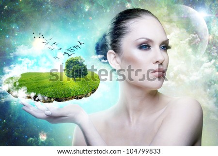 World of Magic. Female portrait with abstract world in hand