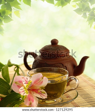 tea ceremony. Green tea, flower and teapot