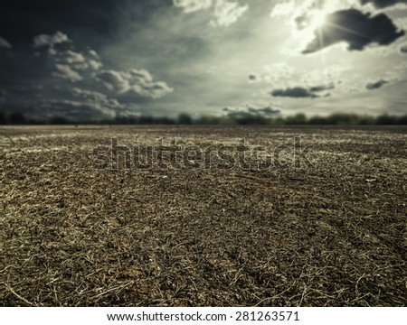 natural disaster. abstract landscape with dry land under mood skies