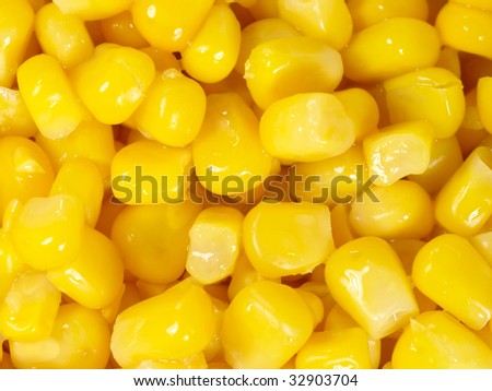 canned corn as is distributed on a plane in a complete shot