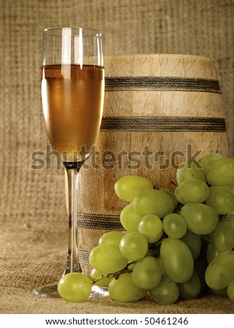 Old wine still-life with grape and wine bowl