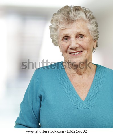 portrait of a senior woman smiling, indoor