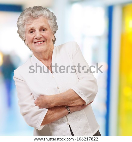 portrait of an adorable senior woman standing indoor