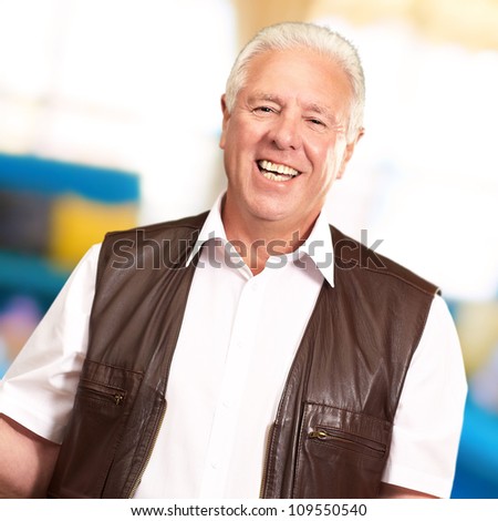 Portrait Of A Senior Man Presenting, Indoor