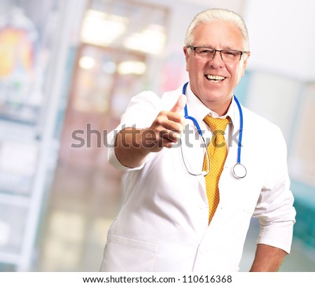 Happy Male Doctor With Thumbs Up, Indoor