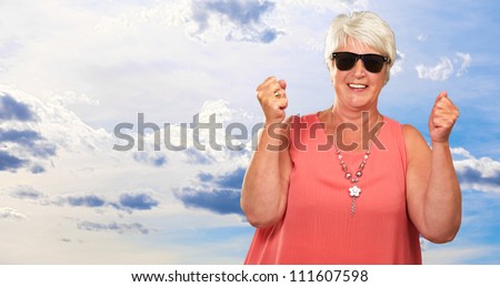 Portrait Of A Senior Woman With A Closed Fist, Outdoor