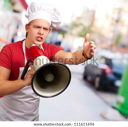 Portrait Of A Young Man With Megaphone, Outdoor
