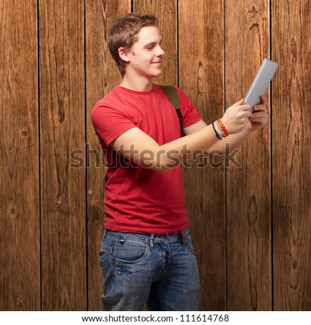 man holding wood