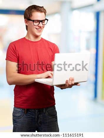 Man using laptop, indoor
