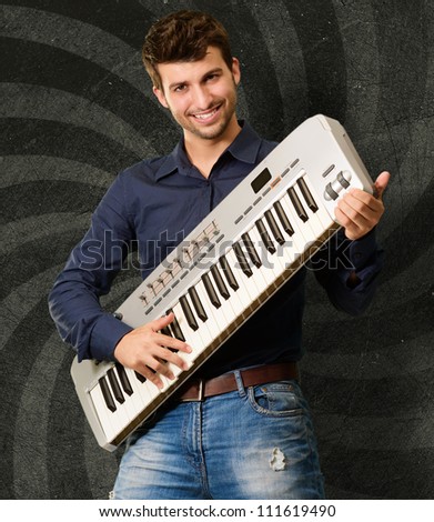 Portrait Of A Man Holding Piano, Wallpaper