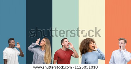 Group of people over vintage colors background shouting and screaming loud to side with hand on mouth. Communication concept.
