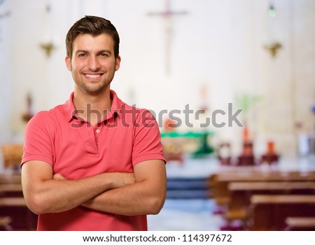 Portrait Of Happy A Man Standing In Church
