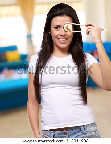 Portrait Of A Female Holding Sushi Roll, Indoor