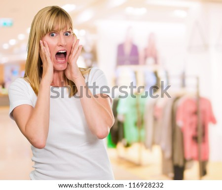 Portrait Of Shocked Woman at a clothes shop