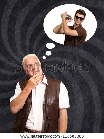 Senior Man Thinking About Man Holding Shaker On Wallpaper