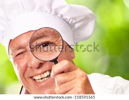 Portrait Of A Chef Holding Magnifying Glass, Outdoor