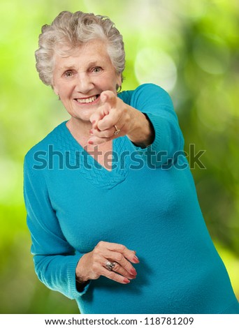 Portrait Of Woman Pointing Her Finger, Outdoor