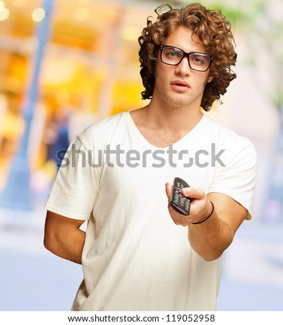 Man Holding Remote Control, Outdoor