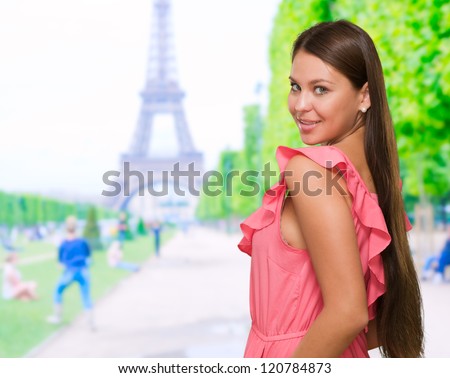 Portrait Of Pretty Woman In Pink Dress in paris