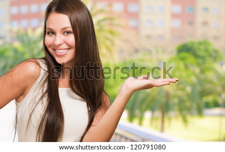 Happy Woman doing a gesture, outdoor