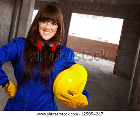 Portrait of a young female worker, outdoor