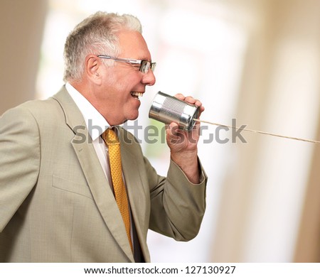 Senior Man Holding Tin, Outdoors