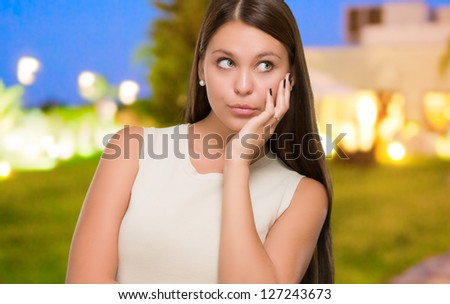 Portrait Of A Young Confused Woman, outdoor