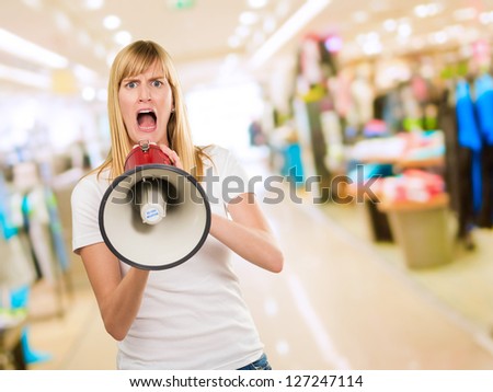 Woman Screaming Through Megaphone at the mall