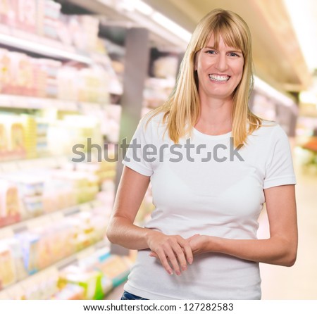 Portrait Of Happy Woman at a supermarket