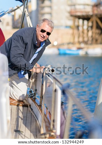 Portrait Of Mature Man On Sailboat, Outdoors