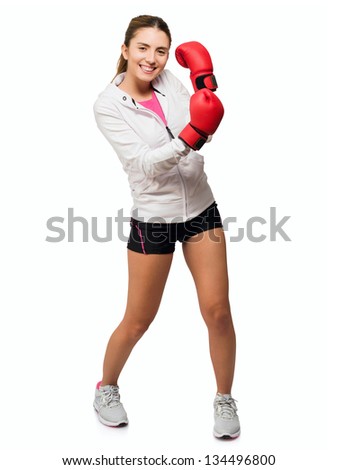 Young Woman With Boxing Glove Isolated On White Background