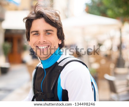 Portrait Of Happy Young Man Cyclist; Outdoors