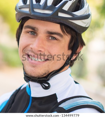 Happy Young Male Cyclist; Outdoors
