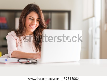 Happy Young Beautiful Woman Using Laptop, Indoors
