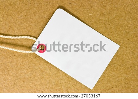 blank tag on cardboard background