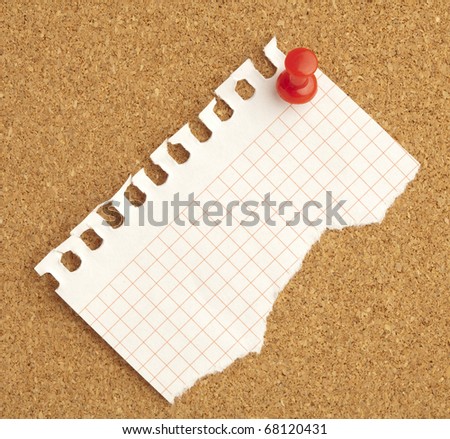 note with red thumbtack on cork billboard texture
